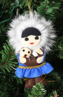 FUR ESKIMO GIRL WITH OTTER ORNAMENT